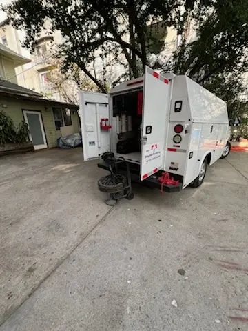 Magnet Plumbing service vehicle on-site for Grease Trap Cleaning in Lago Mar